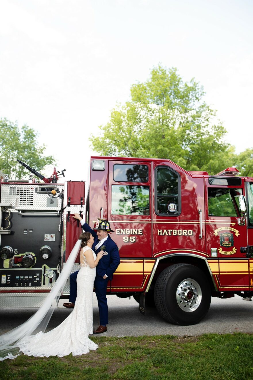 bride and groom fire truck photo