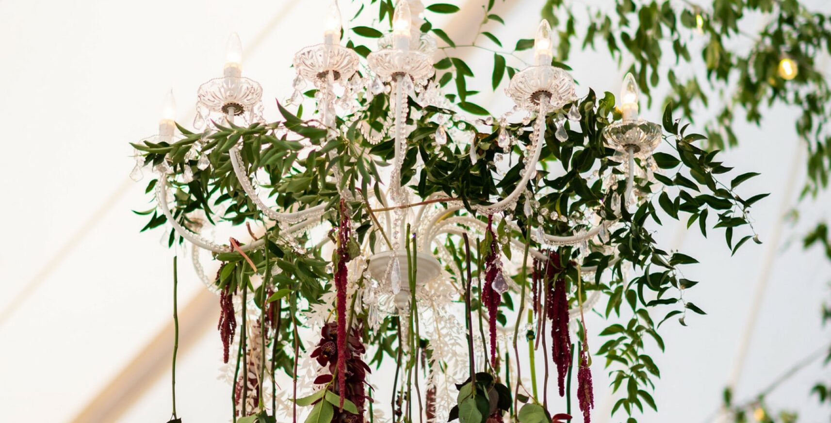 floral decor hanging from tent