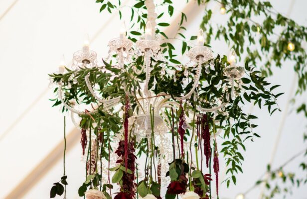 floral decor hanging from tent
